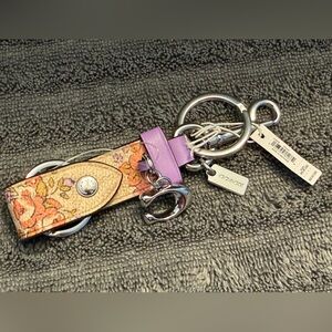 Coach Trigger Snap Bag Charm with Floral Print in lilac/multi- NEW